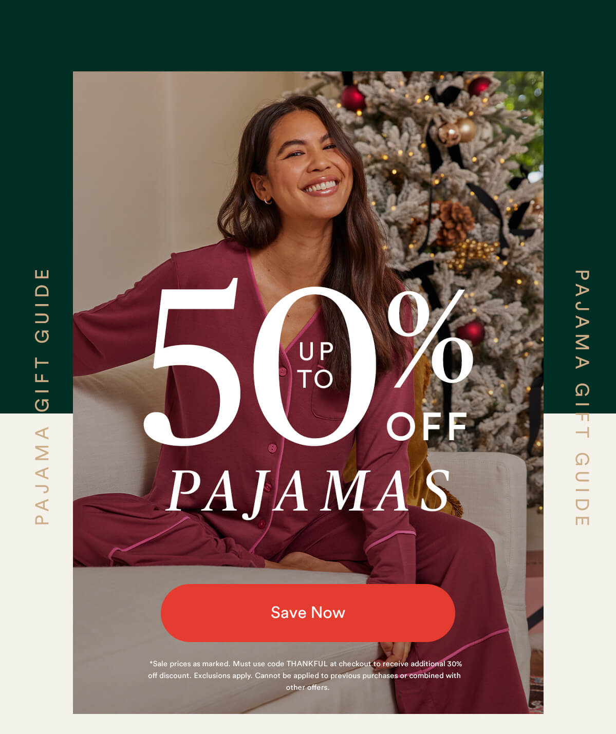 Up to 50% off pajamas. Image of brunette woman sitting on couch in front of a Christmas tree wearing Summersalt Cloud 9 PJ set in Garnet & Hibiscus