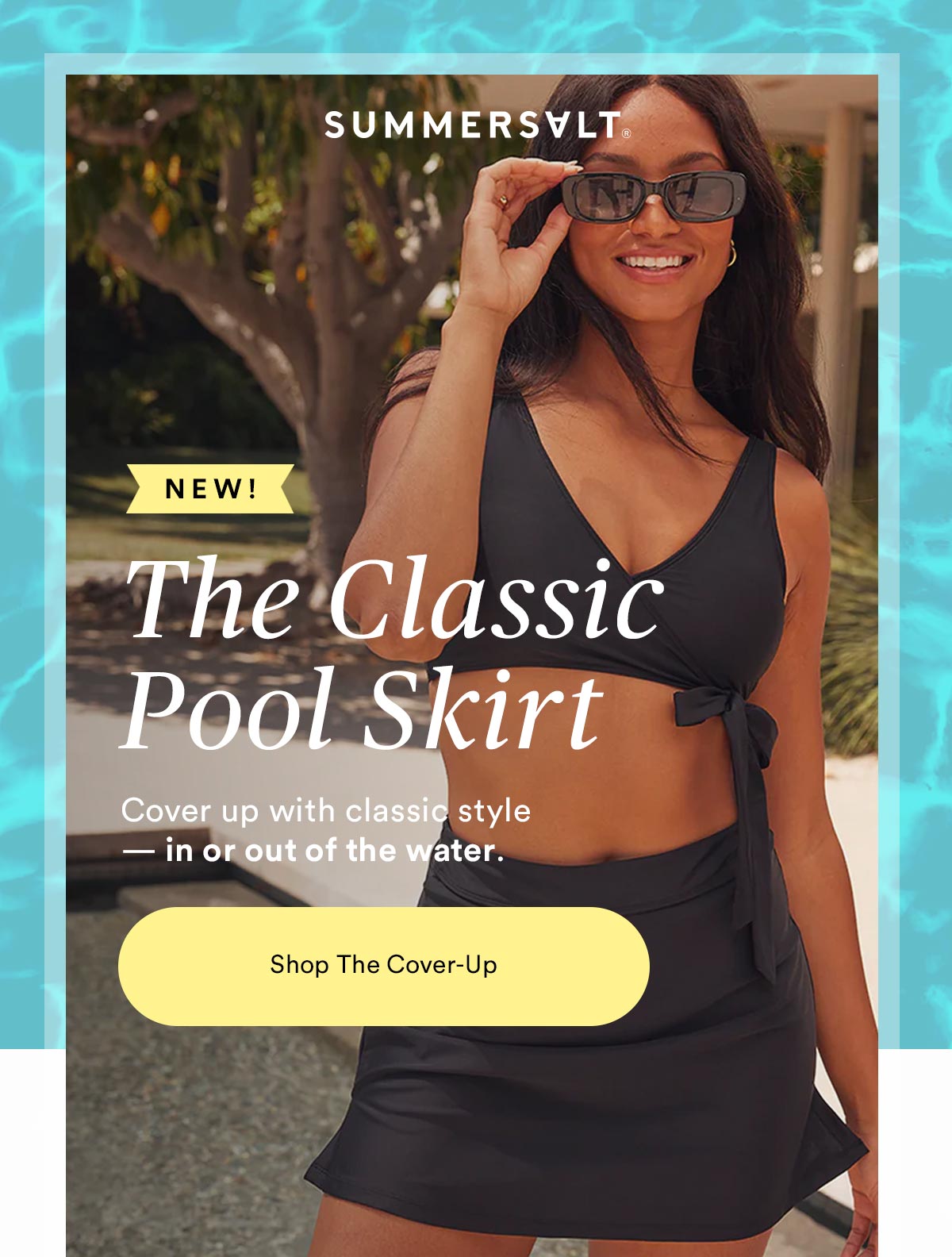 The Classic Pool Skirt. Cover up with classic style - in or out of the water. Lifestyle image of woman wearing The Classic Pool Skirt.