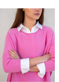 Close up pink cashmere sweater with rolled hem