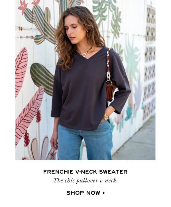 Frenchie V-neck Sweater - The chic pullover v-neck. Shop now - woman on sidewalk wearing gray v-neck sweater