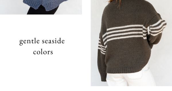 Gentle Seaside Colors - back of woman wearing green sweater with stripes