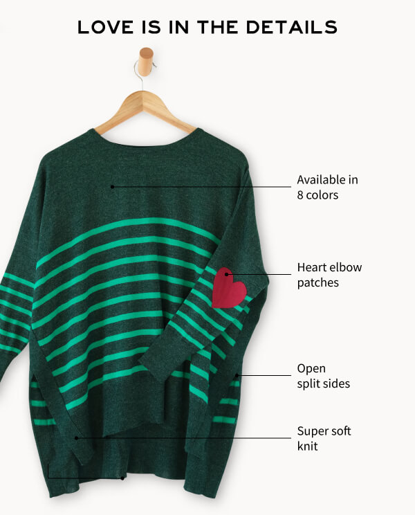 Love is in the details - Image of a green striped sweater with red heart patches on the elbow on a hanger with details called out