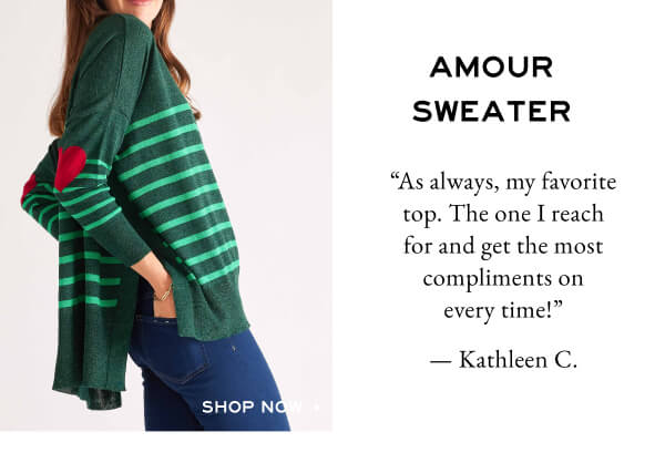 Amour Sweater - Shop now - Review from a customer describing why the amour is her favorite sweater. - Image of woman wearing a green stripe sweater with red heart patches on the elbows