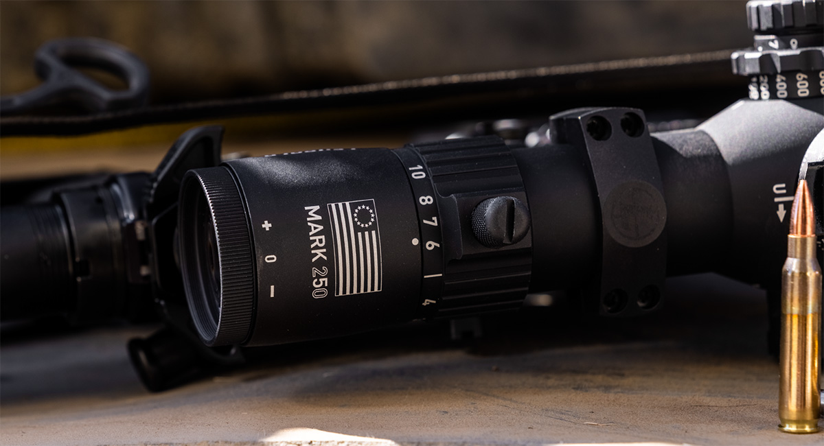 Showing the custom engraving that says Mark 250 with the Betsy Ross flag with 13 stars.