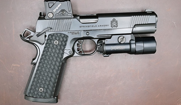 NOT YOUR GRANDPA'S .45: REVIEW OF THE SPRINGFIELD ARMORY TRP 1911 WITH AIMPOINT COA RED DOT