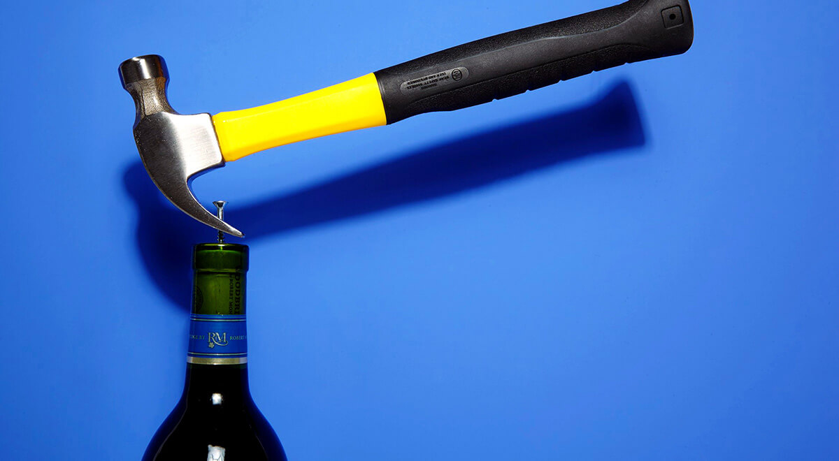 How to Open a Bottle of Wine When You Don’t Have a Corkscrew Handy