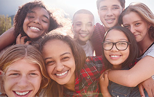 A group of smiling teenagers