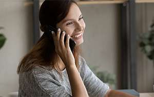 A woman having a conversation on her phone