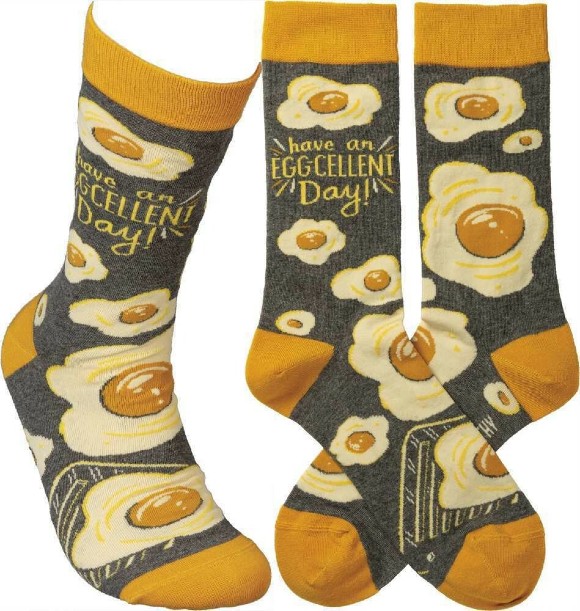 Gray socks with yellow trim and egg illustrations that say "Have an Eggcellent Day"