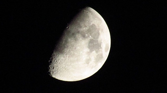 Half-full Moon in black sky