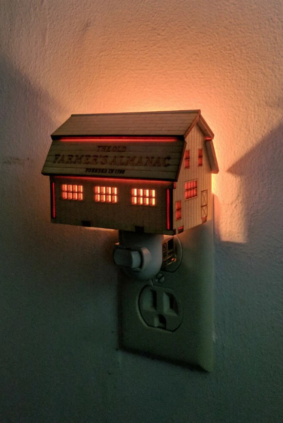 Almanac barn night light turned on in darkness