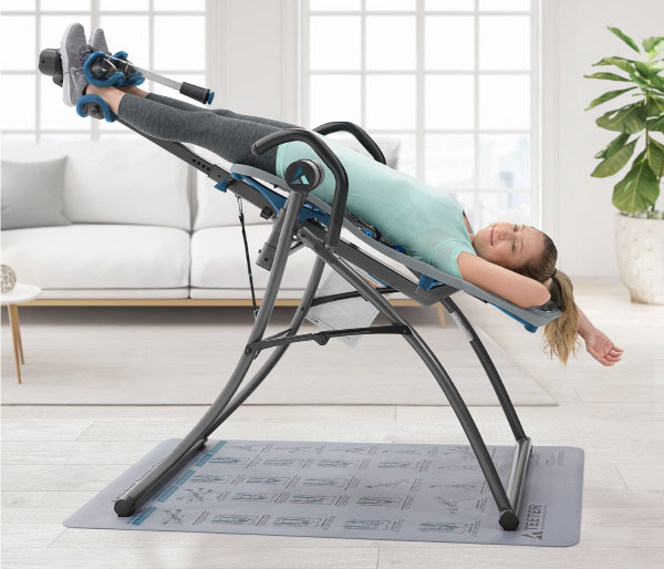 image of a woman on a inversion table