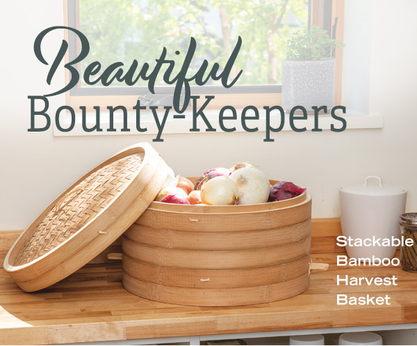 Beautiful Bounty-Keepers - Pictured: Stackable Bamboo Harvest Basket loaded with onions, sitting on a wooden kitchen counter.