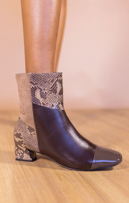 MAVATI faux leather and textured reptile print block heel bootie