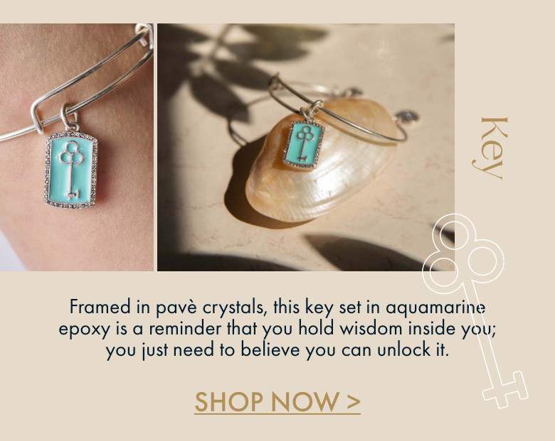  Framed in pav crystals, this key set in aquamarine epoxy is a reminder that you hold wisdom inside you; you just need to believe you can unlock it. SHOP NOW 