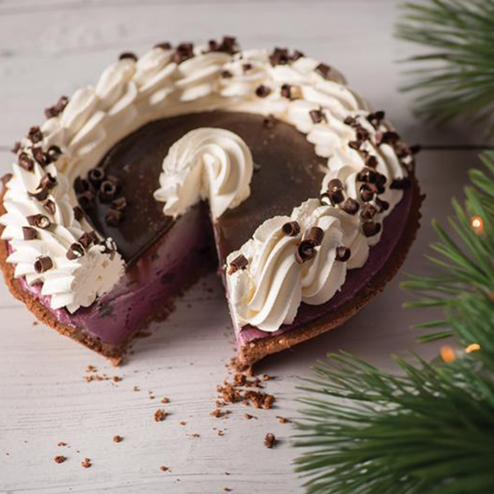 Box of ice cream under a Christmas tree.